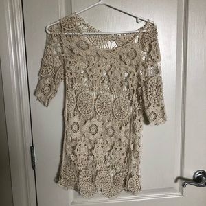 Cream crochet top.